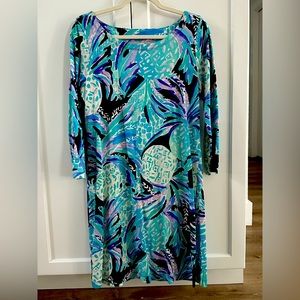 Never worn Lilly Pulitzer dress. 3/4 sleeve pineapple pattern.Cute back detail.